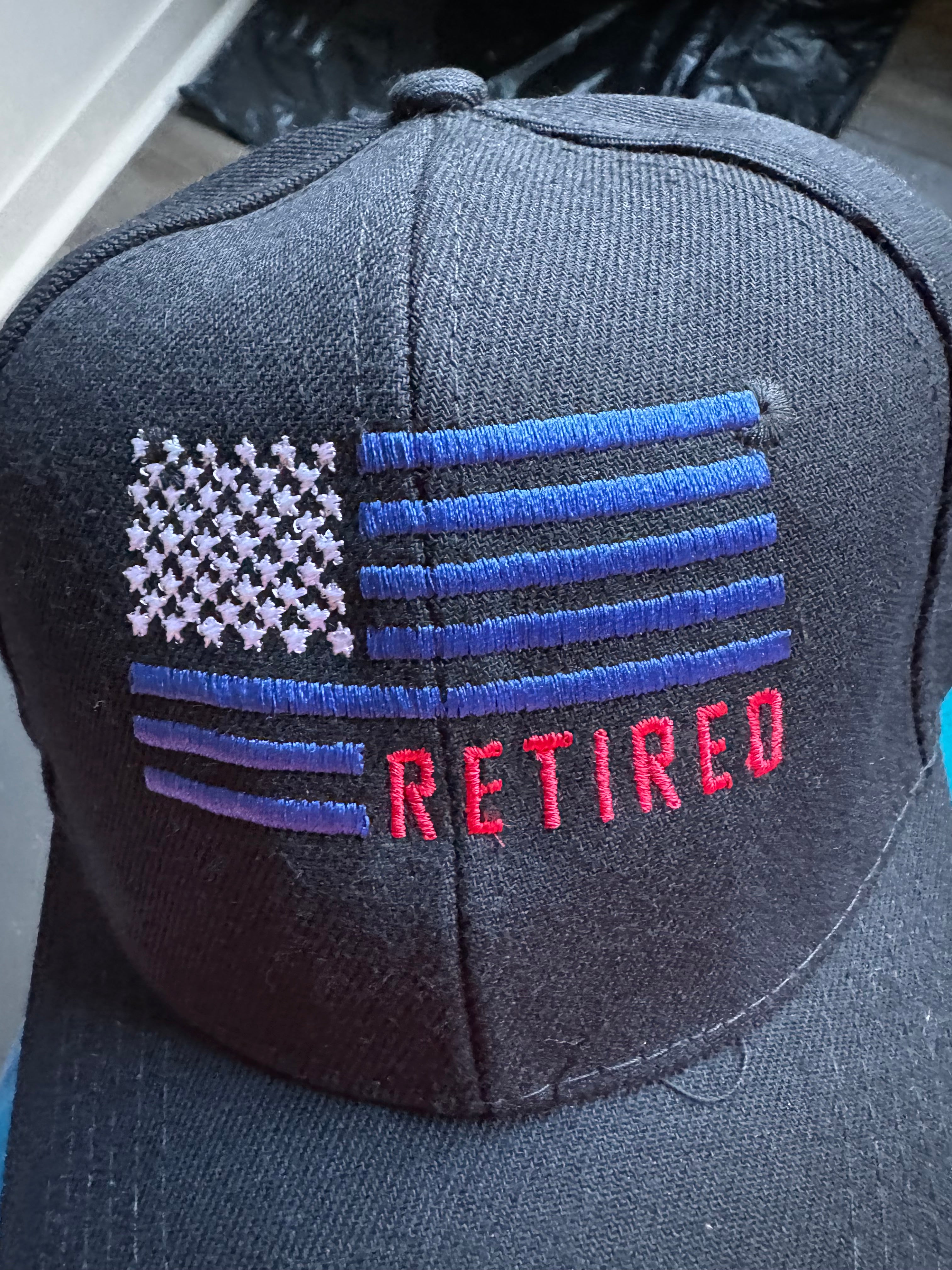 Retired embroidered hats logo  American Flag